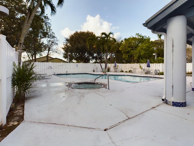 view of swimming pool featuring a patio