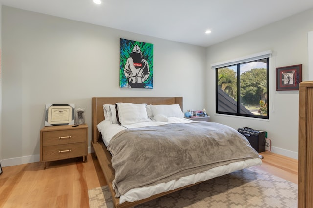 bedroom featuring light wood-type flooring