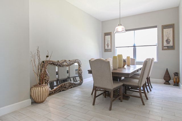 dining space featuring light hardwood / wood-style floors