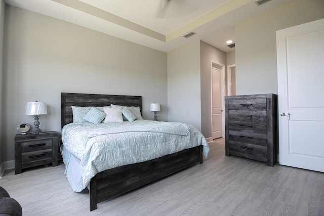 bedroom featuring light hardwood / wood-style flooring