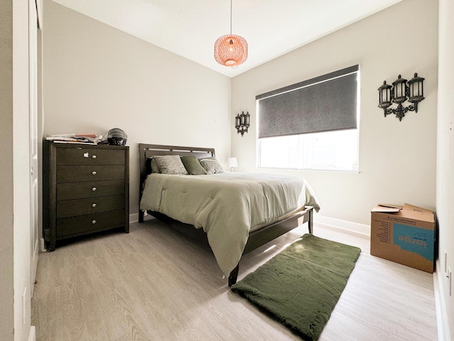 bedroom with light wood-type flooring