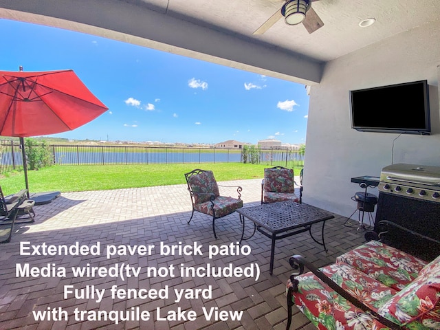 view of patio / terrace with grilling area and ceiling fan