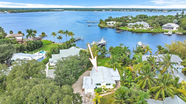 birds eye view of property featuring a water view