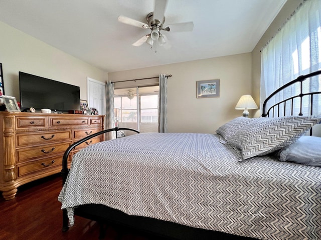 bedroom featuring ceiling fan and dark hardwood / wood-style floors