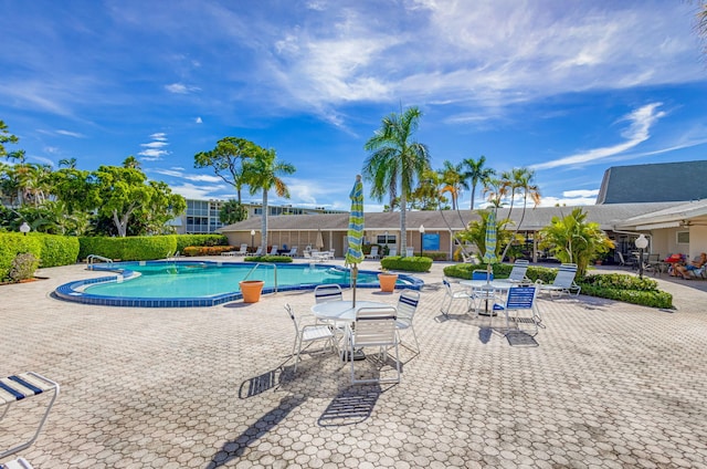 view of swimming pool featuring a patio area