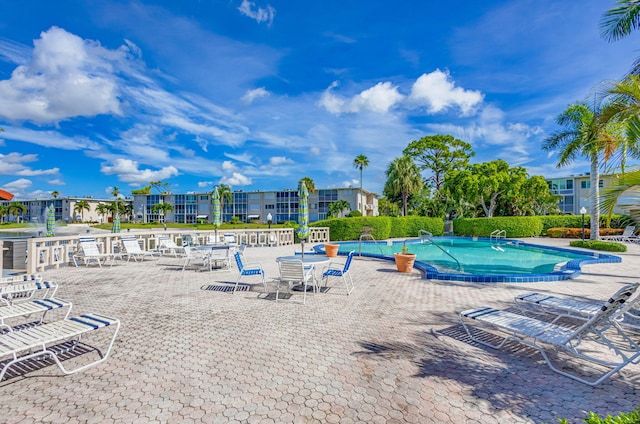 view of pool featuring a patio