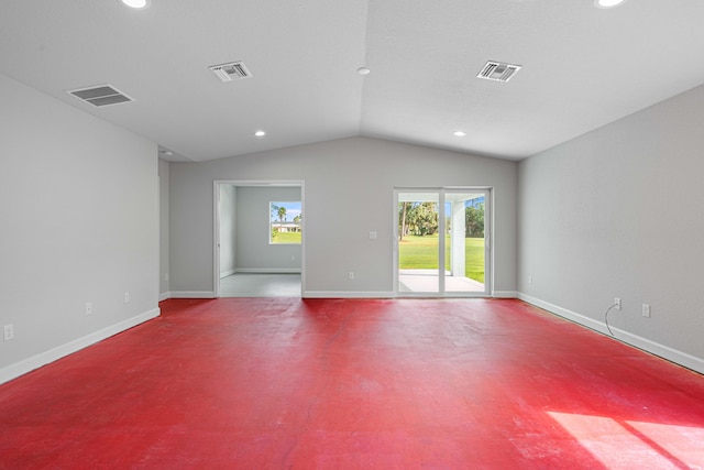 empty room with lofted ceiling