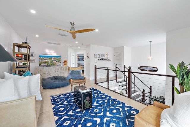 living room featuring ceiling fan