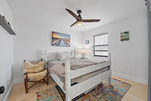 bedroom featuring ceiling fan and light tile patterned floors