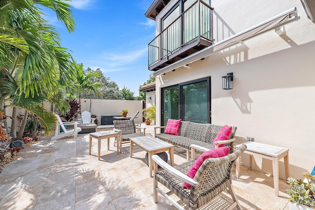 view of patio / terrace with outdoor lounge area and a balcony