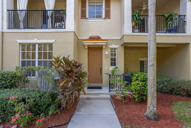 doorway to property featuring a balcony