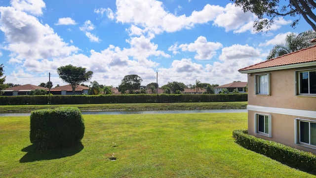 view of yard with a water view