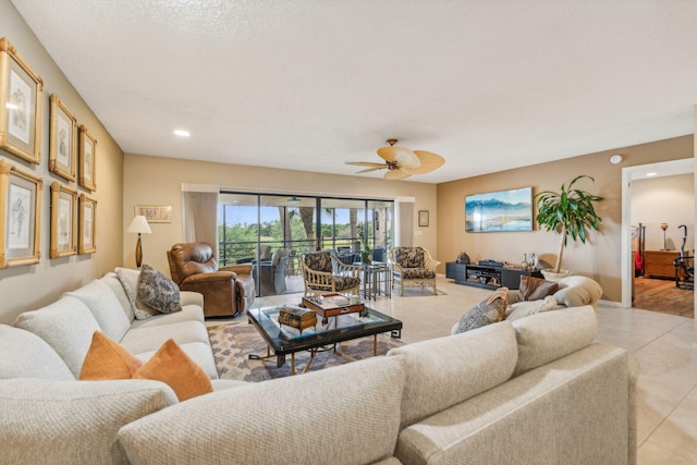 living room featuring ceiling fan