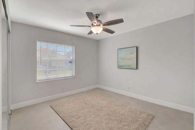 unfurnished room with ceiling fan