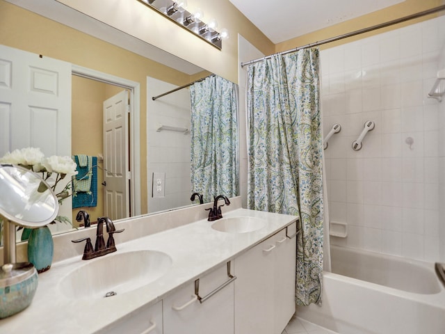 bathroom featuring shower / tub combo, vanity, and tile patterned flooring