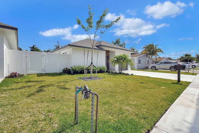 view of front of home with a front yard