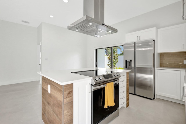 kitchen with stainless steel appliances, backsplash, ventilation hood, a kitchen island, and white cabinets