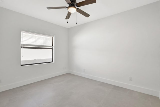 spare room featuring ceiling fan