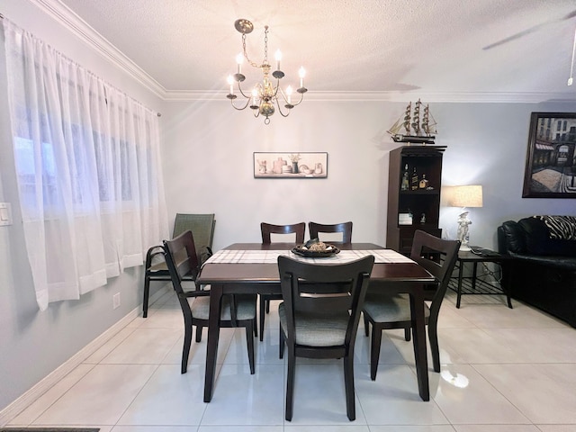 dining space featuring a chandelier, a textured ceiling, light tile patterned floors, and crown molding