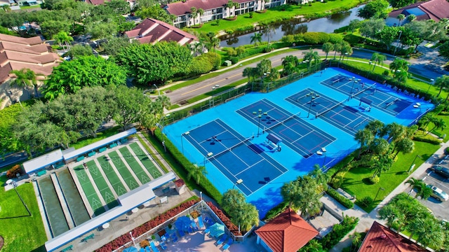 birds eye view of property with a water view