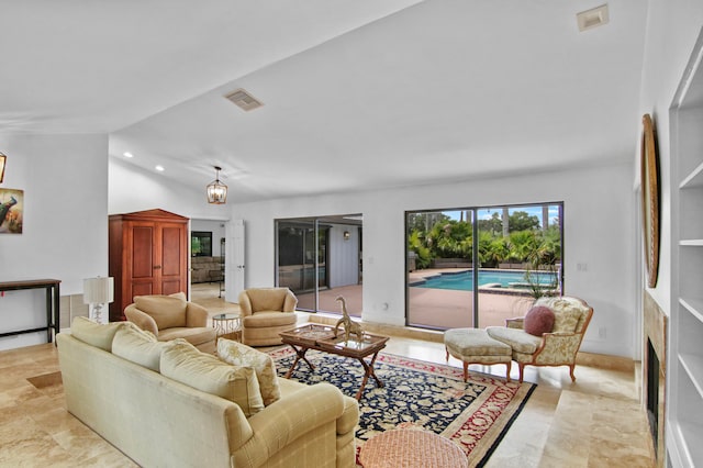 living room with an inviting chandelier