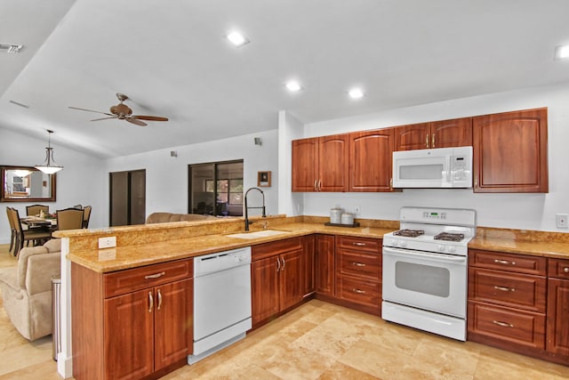 kitchen with kitchen peninsula, ceiling fan, sink, and white appliances