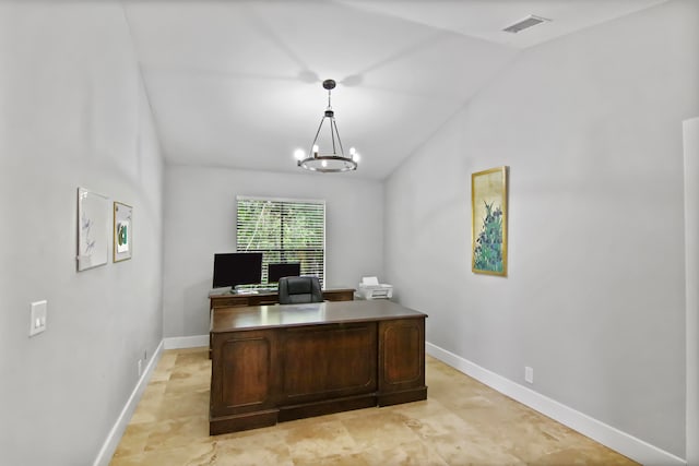 office featuring vaulted ceiling and an inviting chandelier