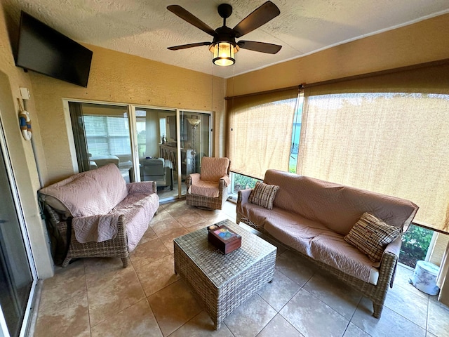 sunroom / solarium with ceiling fan and a wealth of natural light