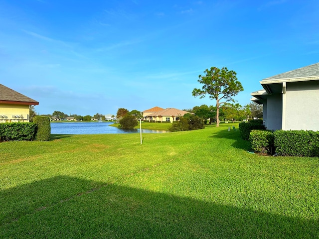 view of yard with a water view