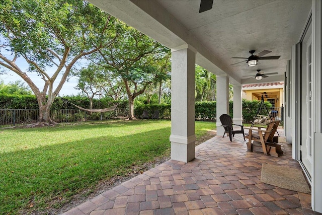 view of patio with ceiling fan