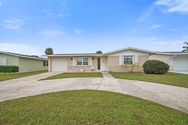 ranch-style house with a front lawn and a garage