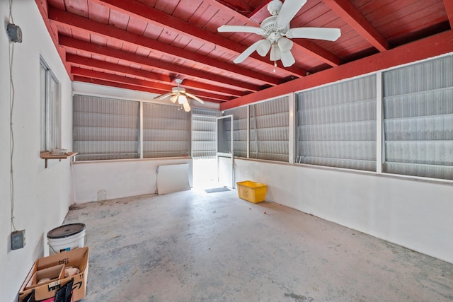 garage with ceiling fan and wood ceiling