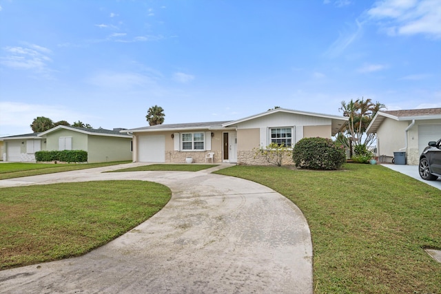 ranch-style house with a garage and a front yard