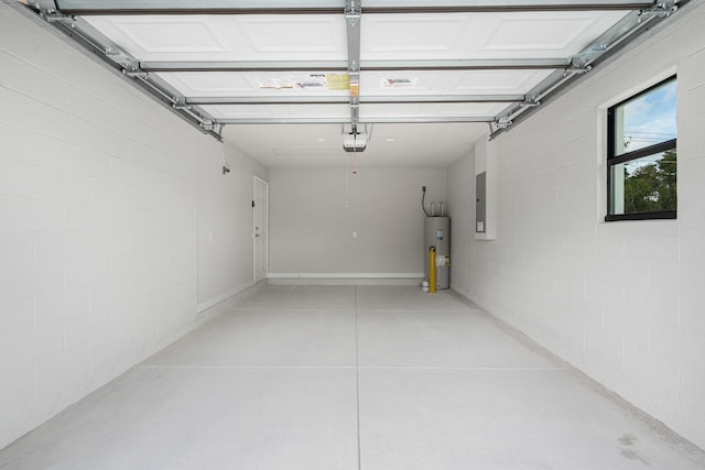 garage featuring electric water heater, a garage door opener, and electric panel