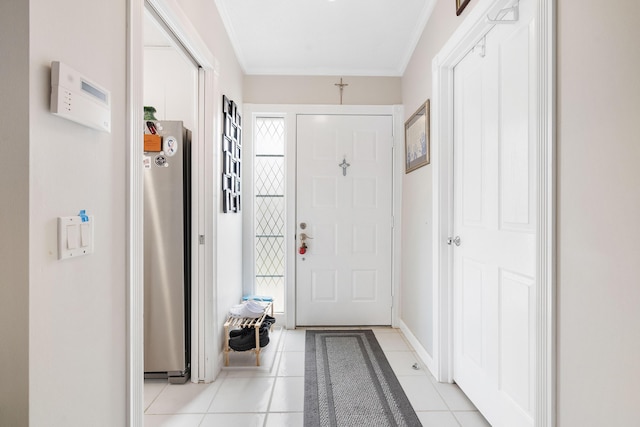 7770 SE Spicewood Cir, Hobe Sound, FL 33455 - foyer with crown molding, light tile patterned floors, and baseboards
