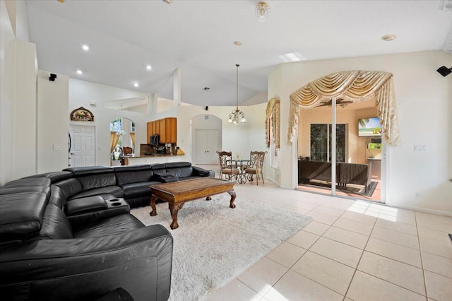 living room featuring light tile patterned floors and lofted ceiling