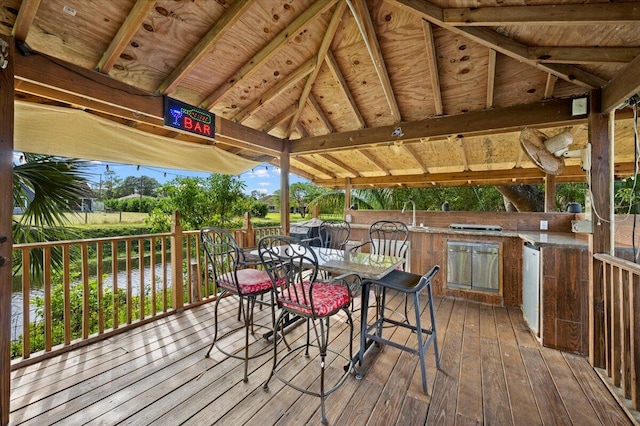 wooden deck with a gazebo