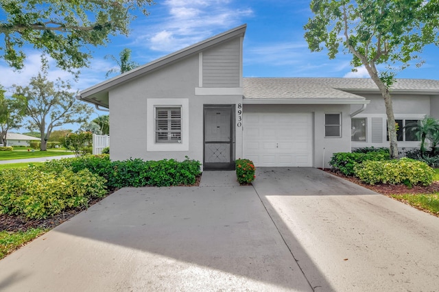 view of front of property with a garage