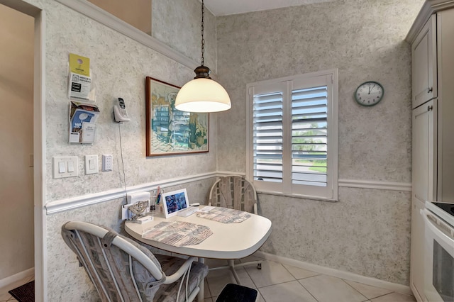 dining space featuring light tile patterned floors