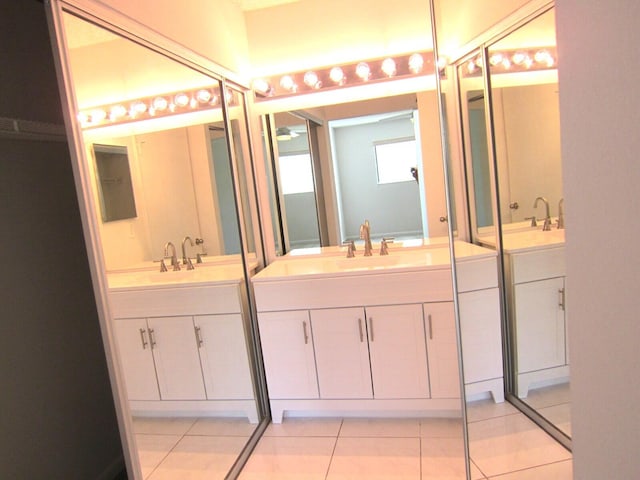 bathroom featuring tile patterned floors and vanity