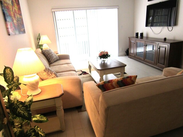 15450 Pembridge Ave E Unit 192, Delray Beach, FL 33484 - dining space with wood-type flooring, an inviting chandelier, and visible vents