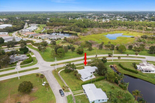 drone / aerial view with a water view