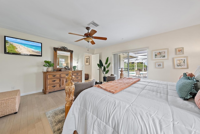 bedroom featuring ceiling fan, light hardwood / wood-style flooring, and access to outside