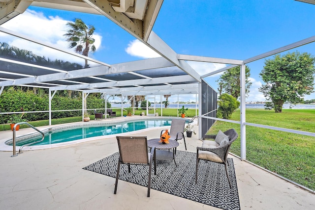 view of swimming pool featuring a patio area, a lawn, a lanai, and a water view