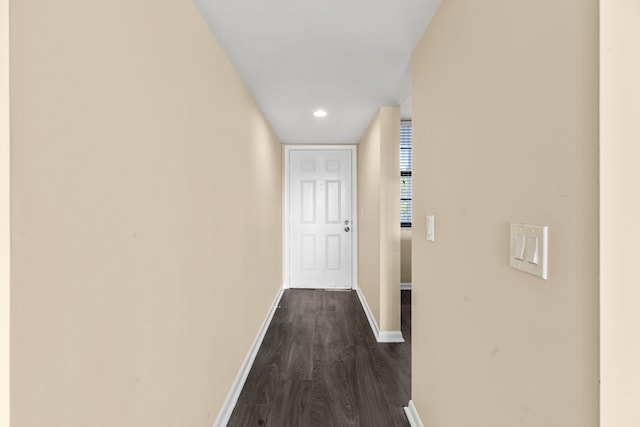 corridor featuring dark hardwood / wood-style flooring