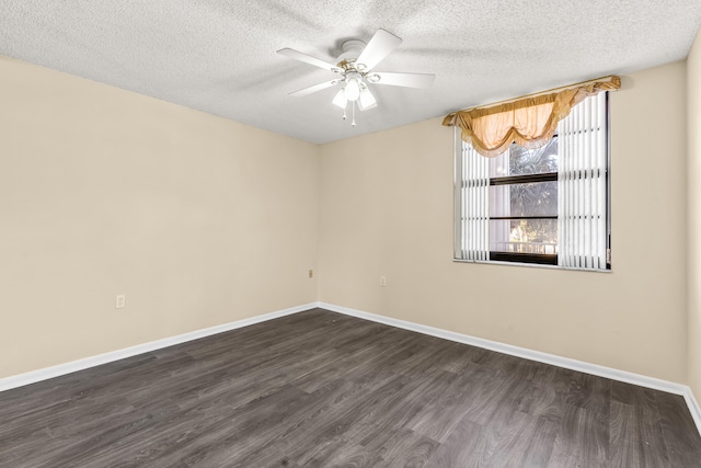 empty room with ceiling fan, a textured ceiling, and dark hardwood / wood-style flooring