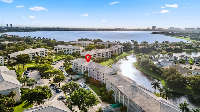 drone / aerial view featuring a water view