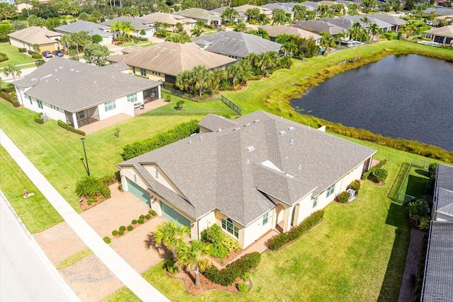 bird's eye view with a water view