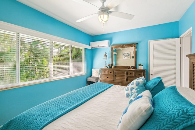 1006 Casuarina Rd Unit 11, Delray Beach, FL 33483 - bedroom featuring a wall unit AC and ceiling fan
