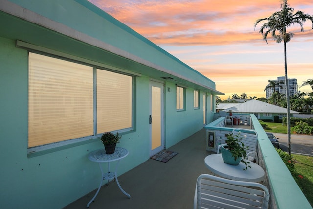 view of patio terrace at dusk